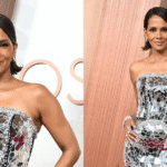 Halle Berry wearing a strapless mirrored silver gown with sleek short hair, posing confidently on the red carpet at a glamorous event